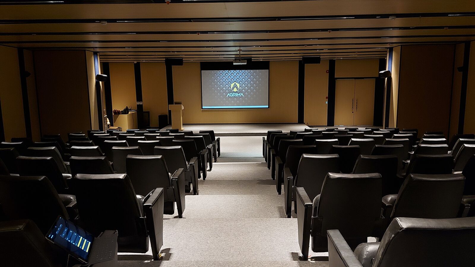 Balaji Wafers auditorium view toward the stage and screen