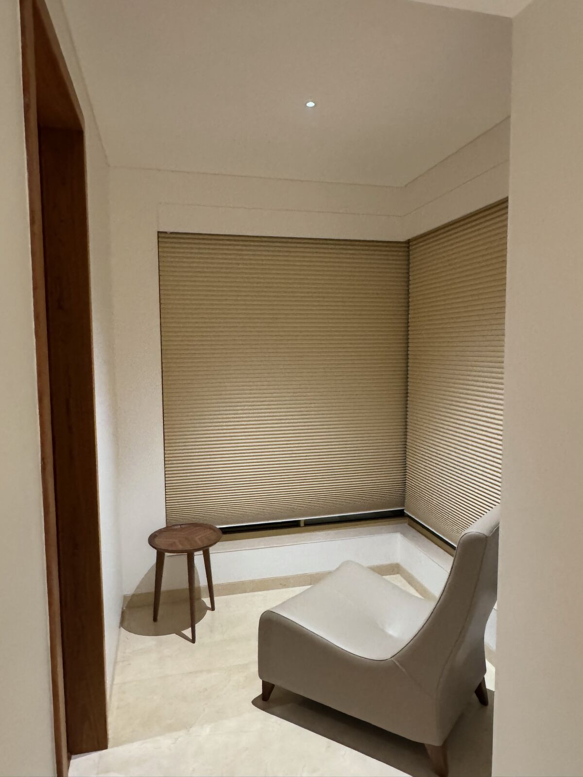 J. Bhalodia Residence hallway with automated pleated blinds