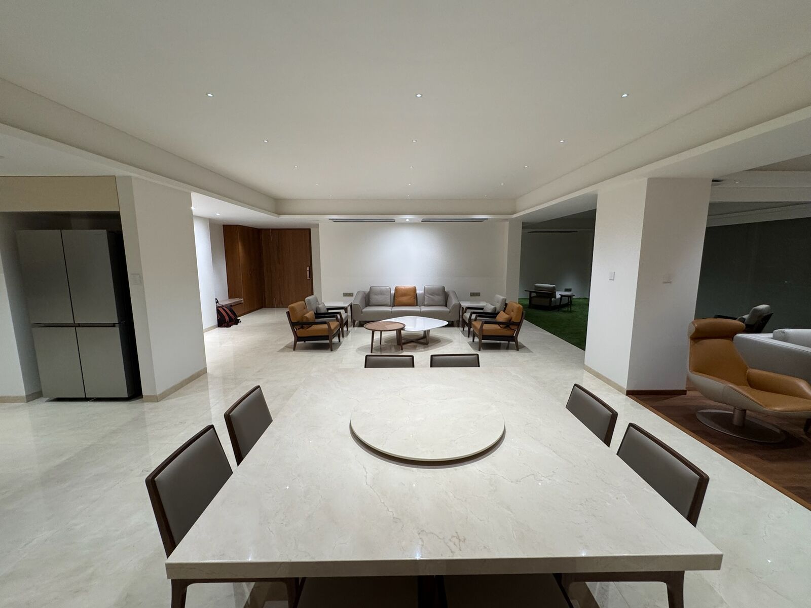 J. Bhalodia Residence open living, dining, and kitchen area