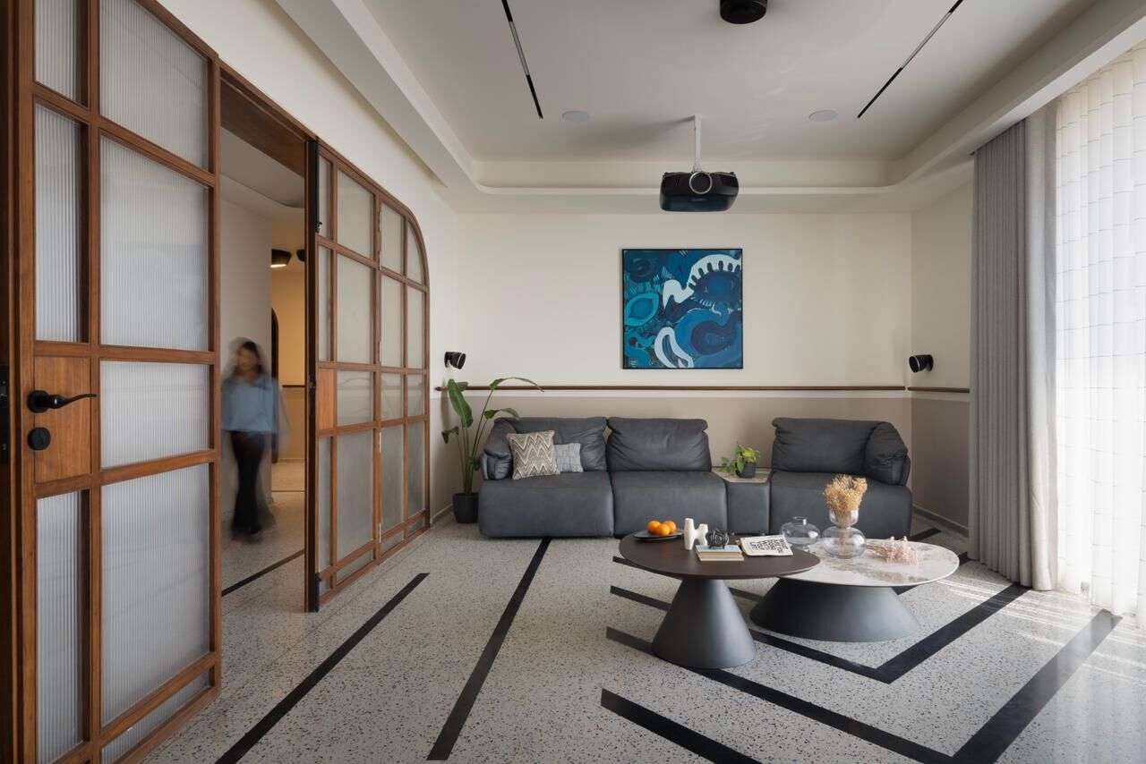 Mayur Gajera residence living room with sliding wood-lattice doors