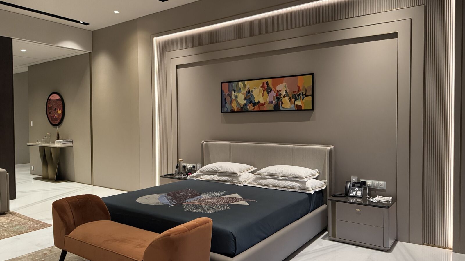 Primary bedroom suite with scene-controlled lighting at the Rohan Kataria residence